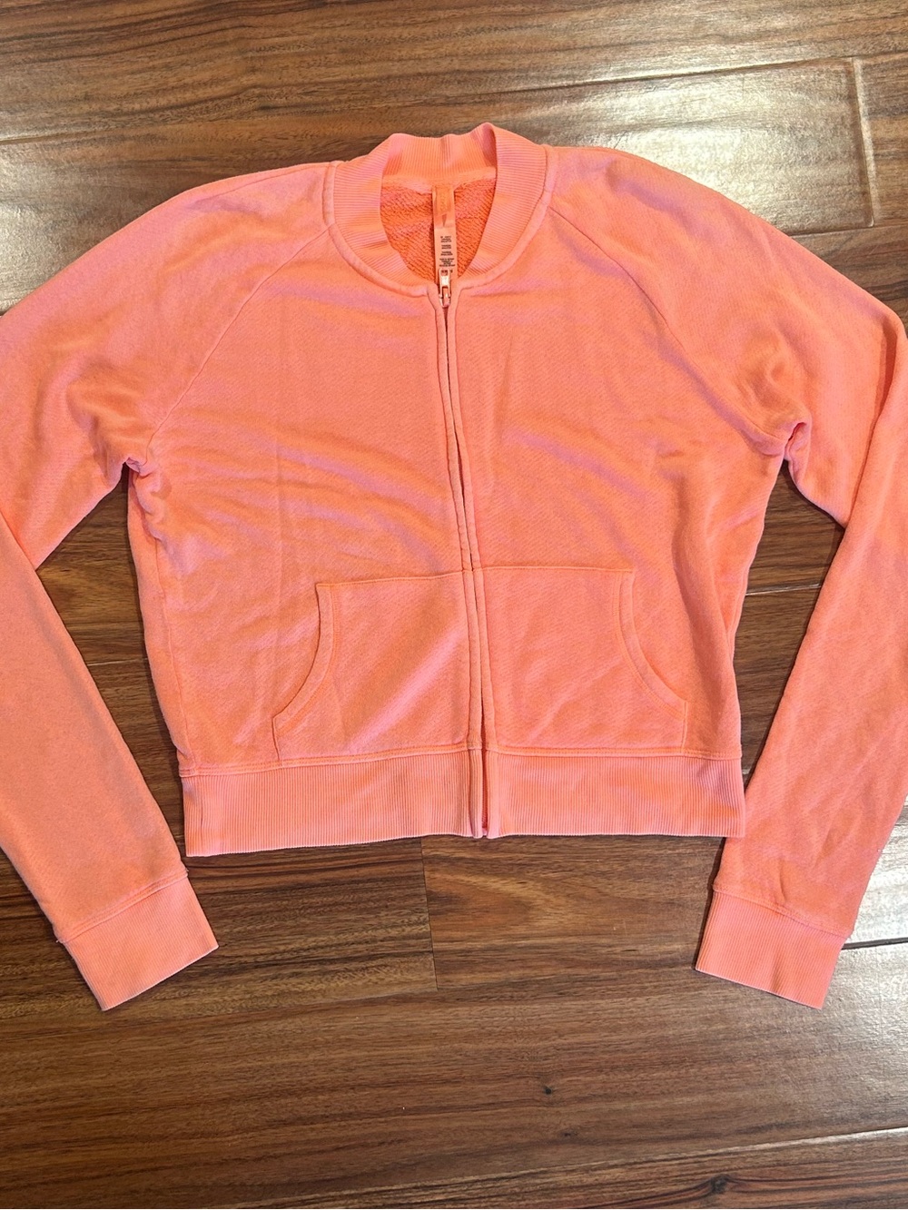 Skims bright orange zip up jacket size large